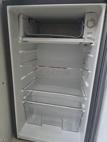 Compact freezer/fridge compartment in good working condition