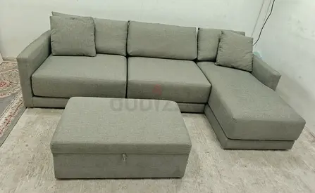 Crate and Barrel gray lshape sofa with ottoman storage