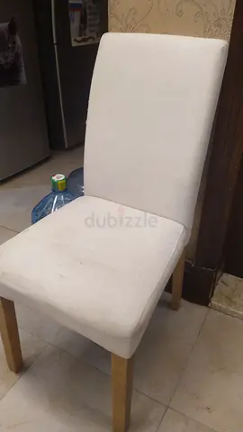 Light beige fabric dining/side chair with wooden legs - good condition .have 3