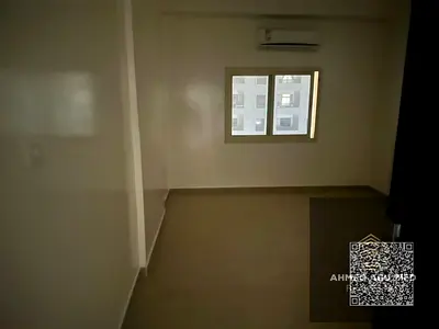 Bedroom Apartment in New Building (2nd Tenant) for Annual Rent in Al Rawda 2 - Opposite Kenz Mall | Free Parking & Laundry Room An outstanding reside