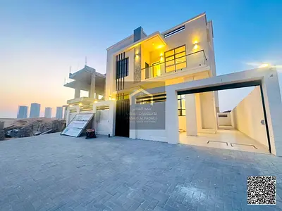 Prime Dual-Street Location: Modern 3-Storey 5-Master Bedroom Villa Facing Azha Project for Sale in Al Helio 2, Ajman – Features Front & Back Paved Acc