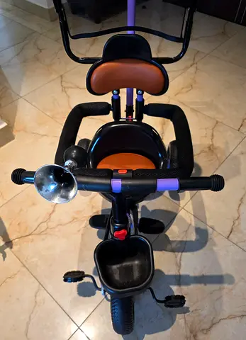 Kids 3-in-1 Tricycle with Push Handle and Safety Bar - Good Condition along with baby walker