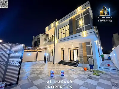 Villa for sale in Al Rawda, spacious land area 5000 sq ft with an external annex, two floors and a roof. Price includes air conditioning and is negoti