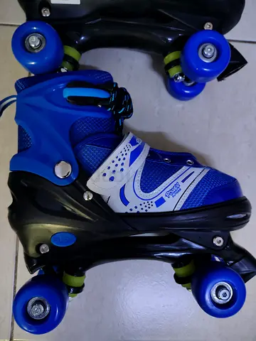 Blue kids quad roller skates - adjustable, good condition