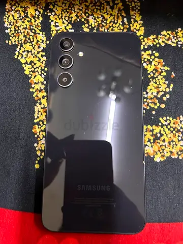 Samsung Galaxy A54 5G phone with triple rear cameras - good condition