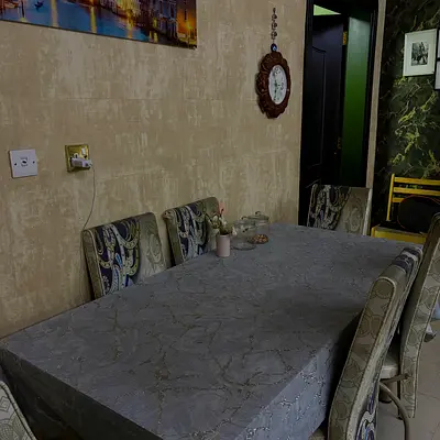 Dining Table with Six Patterned Chairs
