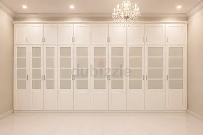 Large White Built-in Wardrobe with Glass Panels