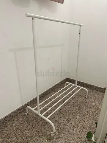 IKEA RIGGA Clothes Rack with Wheels – White (AED 40)
