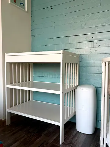 White changing table with two shelves