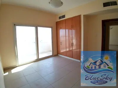 Family building 2BHK With Balcony wardrobe close to abu Shagara Park rent 40k