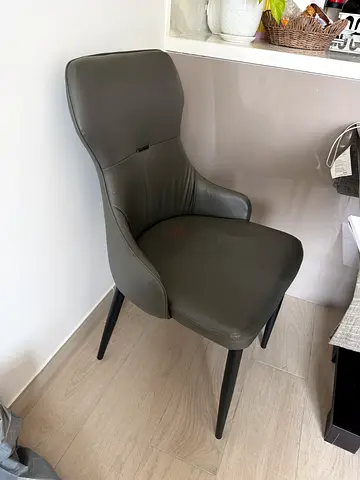 Modern grey faux-leather dining/desk chair — good condition