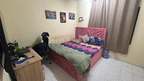 Pink upholstered double bed with headboard and storage - good condition