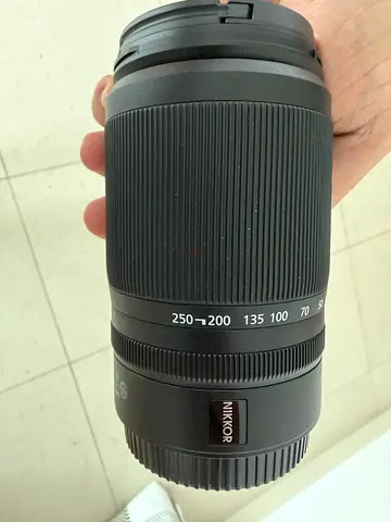Nikon Z50 mirrorless with kit lens, zoom lens, battery, camera bag and tripod