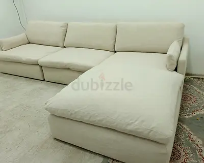 Home center beige color feather 🪶 filled modular sofa with ottoman