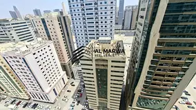 Spacious 2BHK with balcony and built-in wardrobe