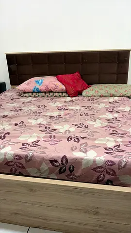Queen bed frame with padded headboard - good condition