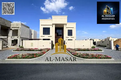 Spacious villa in Al Yasmeen featuring an internal elevator and central air conditioning; freehold ownership available to all nationalities.