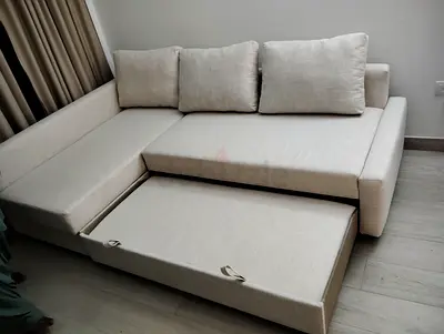 Beige L-shaped Sofa with Pull-out Bed and Storage, Good Condition