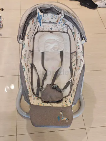 Baby rocker/bassinet with harness and canopy - gently used