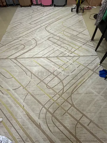 Light grey textured area rug - modern striped design, good condition