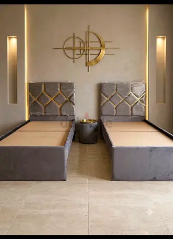 Pair of modern upholstered single beds with headboards - gold velvet not used
