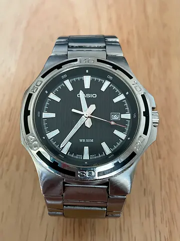 Casio stainless steel men's wristwatch, black dial, date window