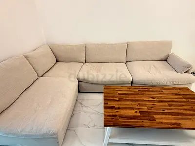 Large 4‑seater fabric sofa, filled with down. Super soft and comfy. Sofa bed.