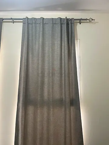 Grey fabric curtains with metal rod - good condition