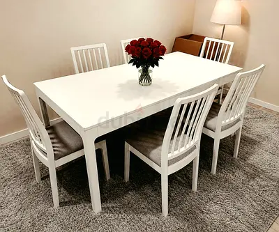 Extendable dining table with 6 chairs white color. IKEA