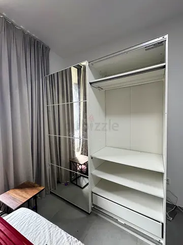White mirrored sliding wardrobe / armoire with shelves (used)