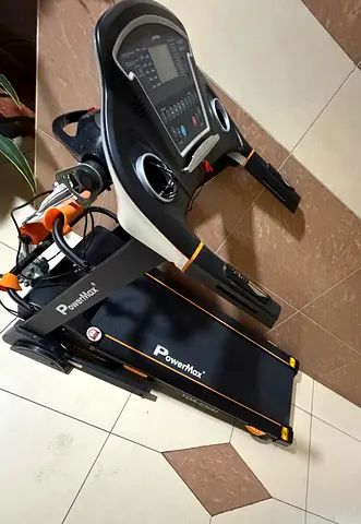 Treadmill with vibration massager