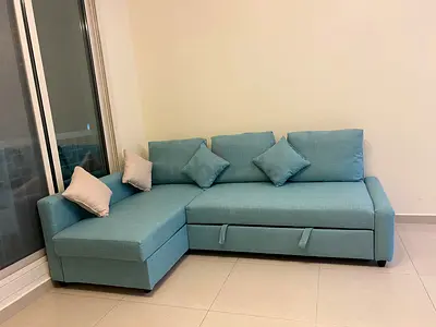 Modern Turquoise L-Shaped Sofa Bed with Storage and Cushions