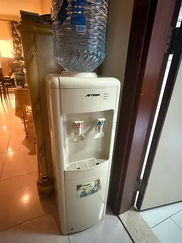 Water cooler/heater for sale due to departure