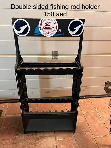 Double sided fishing rod holder