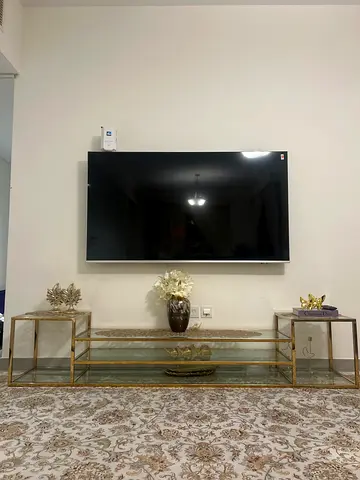 Golden frame glass TV Stand