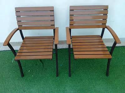 Pair of wooden slat outdoor/patio chairs with metal frame