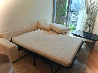 Beige color IKEA sofabed