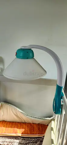 Baby crib mobile projector and music soother