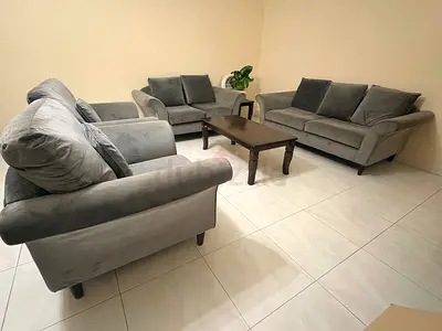 Grey 7 seater sofa set with armchairs and coffee table - good condition