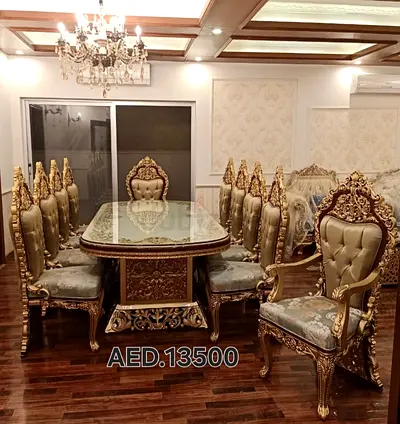 Wooden handmade Ornate Gold 08-Seater Dining Set with Carved Chairs and Glass Top - AED 13,500