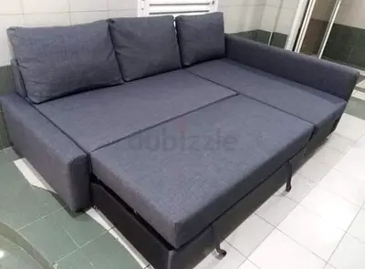 Grey L-shaped Sofa Bed with Storage - Good Condition