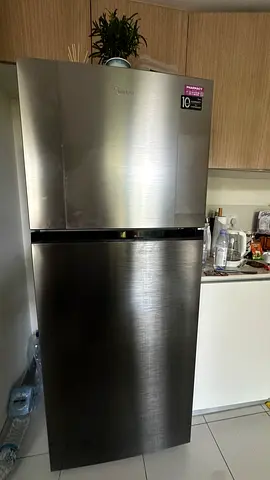 Silver top-freezer refrigerator - good working condition