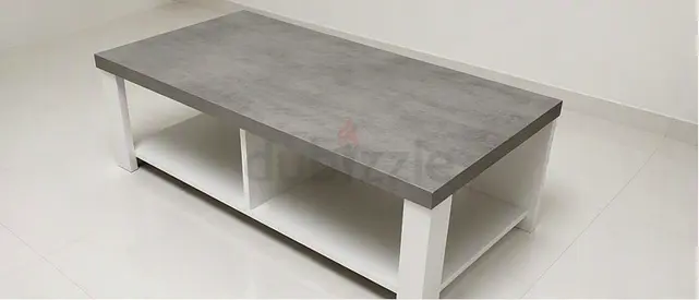 Modern concrete-look coffee table with storage shelf