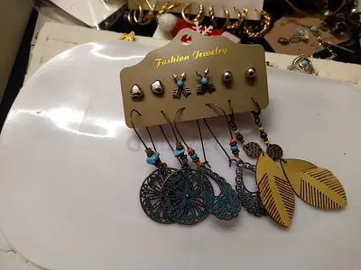 Set of mixed fashion earrings — studs and dangling boho pairs (new on card)