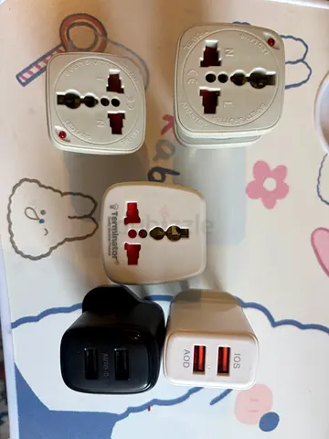 3 Chargers and 5 Universal Travel Adapters - Light Use