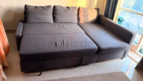 Grey L-shaped sofa cum bed with storage, good condition 3years used