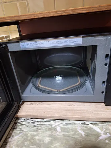 Used microwave oven in good working condition