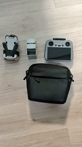 DJI Mini Pro 4 drone with remote, extra battery and carrying bag - good condition