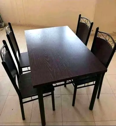 Brand new dining table with 4 chairs available