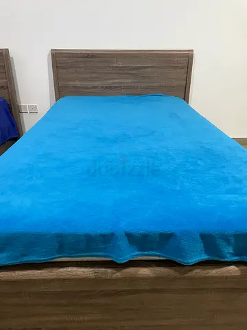 Wooden twin size bed with mattress in Excellent Condition!